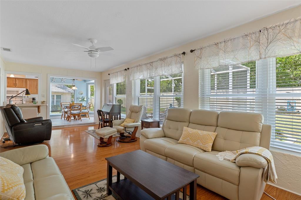 2643 Royal Ridge Drive Spring Hill, FL 34606 - Photo 21 of 84 a living room with furniture and a large window
