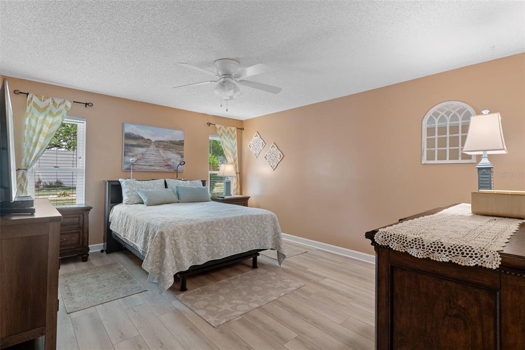 2643 Royal Ridge Drive Spring Hill, FL 34606 - Photo 23 of 84 a bedroom with a bed and a window