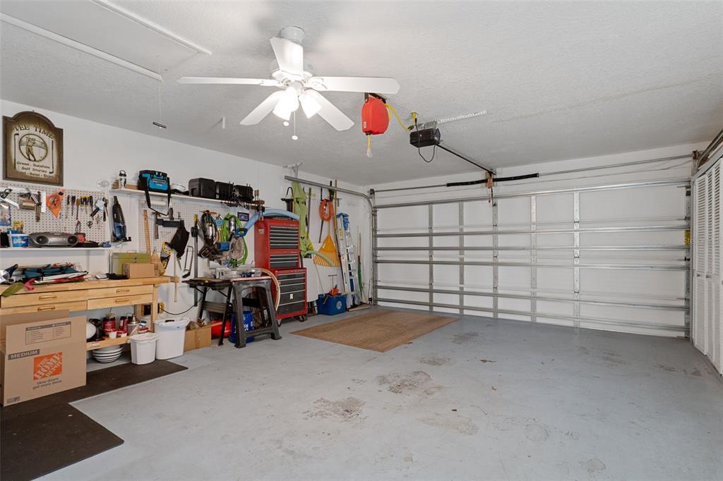 2643 Royal Ridge Drive Spring Hill, FL 34606 - Photo 32 of 84 a view of a garage with a lot of stuff