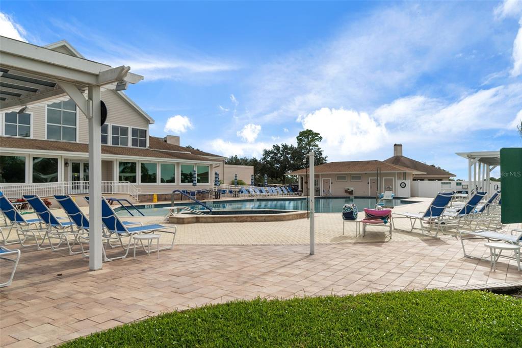 2643 Royal Ridge Drive Spring Hill, FL 34606 - Photo 77 of 84 a view of a house with swimming pool and sitting area
