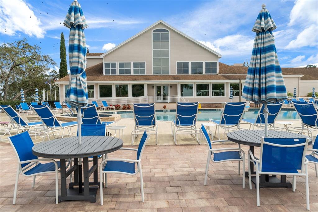 2643 Royal Ridge Drive Spring Hill, FL 34606 - Photo 78 of 84 a view of a dinning table and chairs in the patio