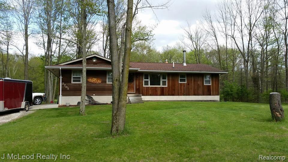7795 Bray Road Vassar, MI 48768 - Photo 1 of 32 front of home.jpg