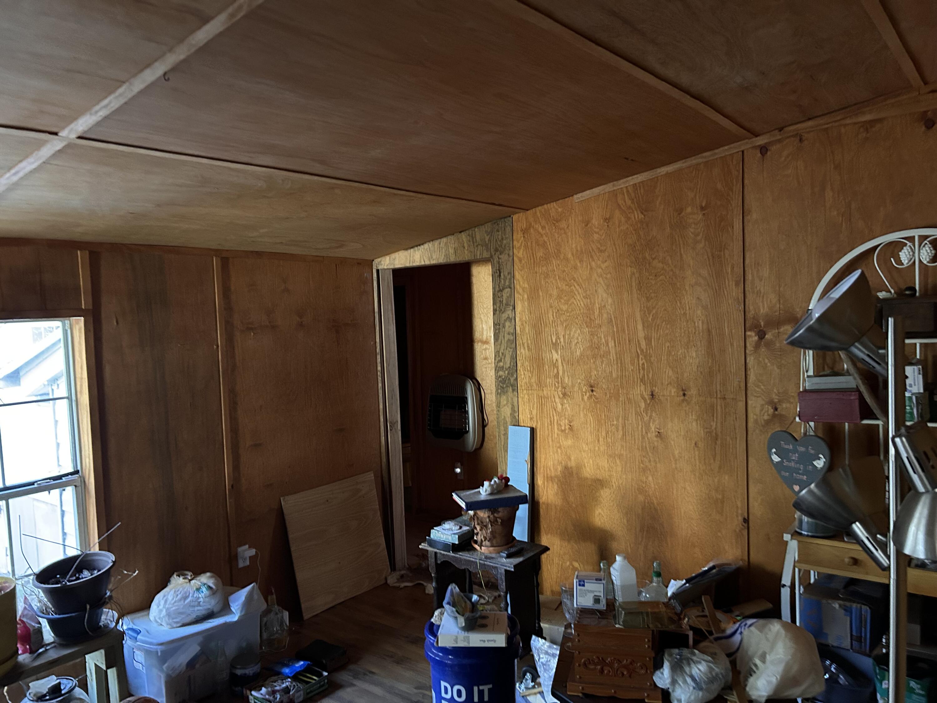 6853 Preston Posey Road Baker, FL 32531 - Photo 8 of 12 a room with wooden furniture and a window