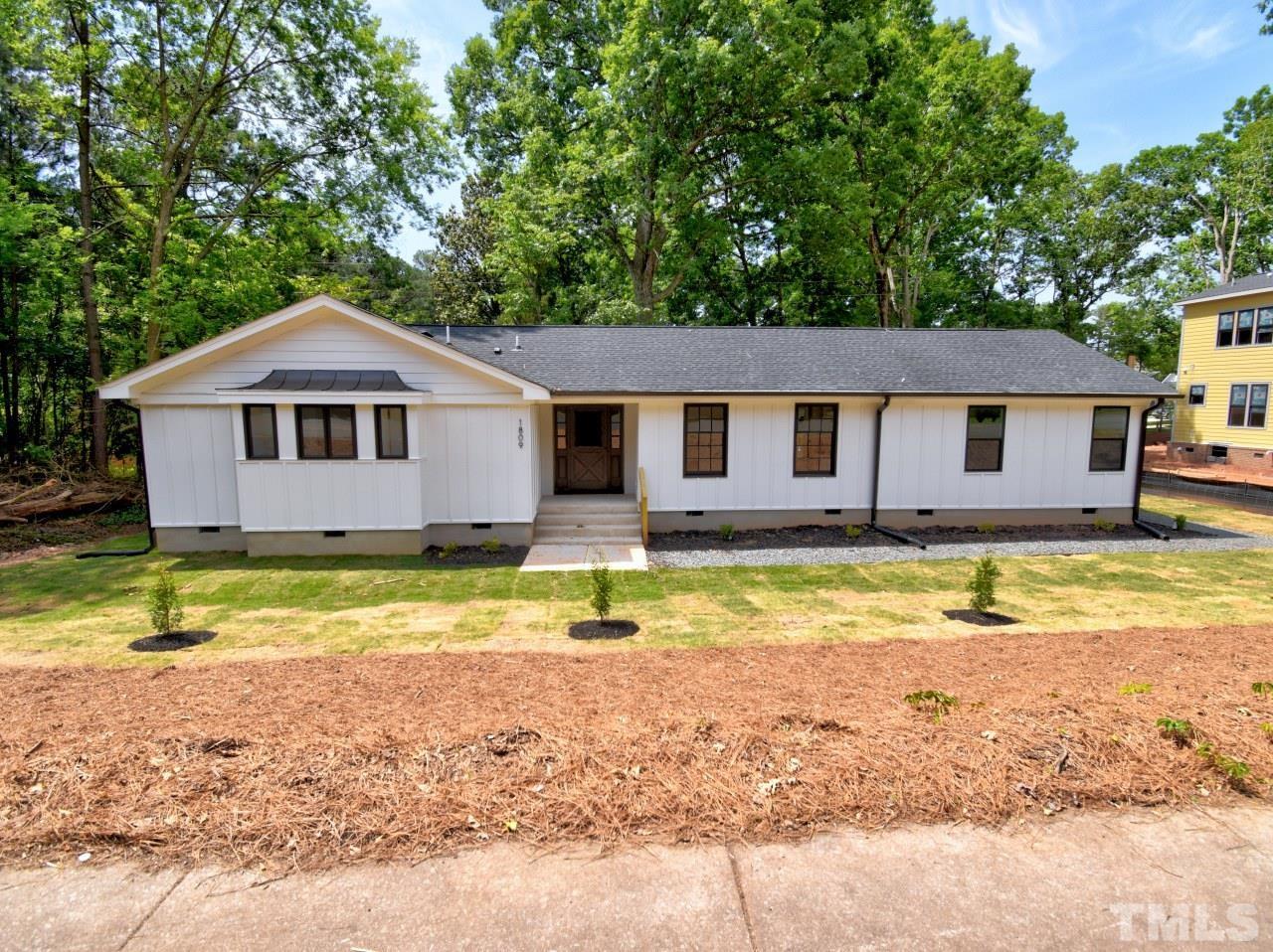 6530 Jean Drive Raleigh, NC 27612 - Photo 1 of 32 a view of a house with a swimming pool