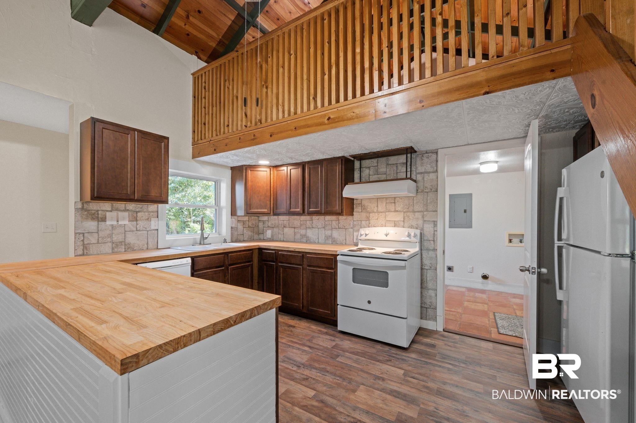 20037 County Road 33 Fairhope, AL 36532 - Photo 48 of 79 Kitchen featuring white appliances, wood ceiling, butcher block countertops, beam ceiling, and exhaust hood