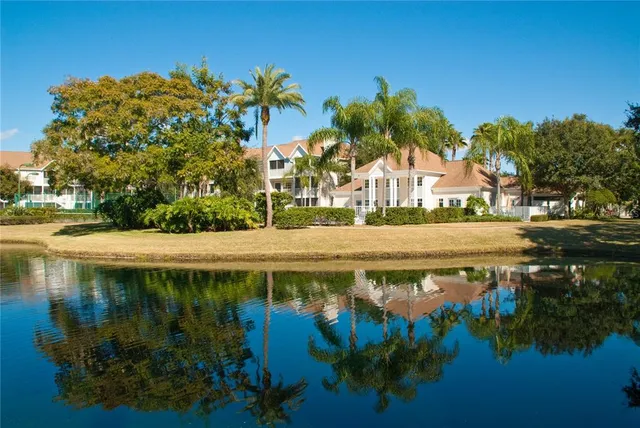 a view of a lake with a big yard