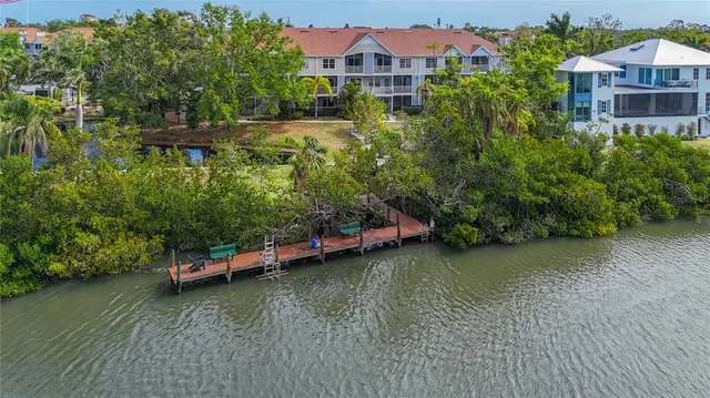 an aerial view of a house with a garden space