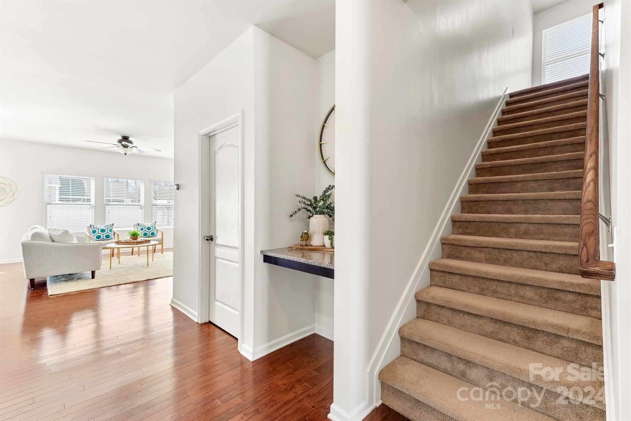 1555 Spring Blossom Trail Fort Mill, SC 29708 - Photo 26 of 47 a view of entryway and hall with wooden floor