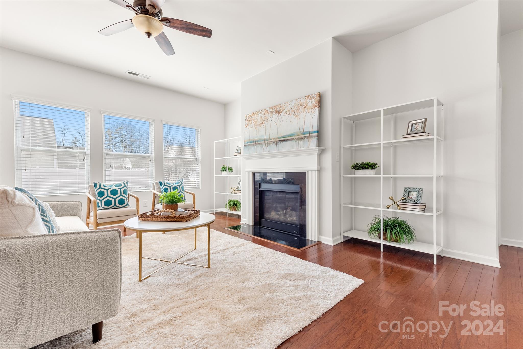 1555 Spring Blossom Trail Fort Mill, SC 29708 - Photo 5 of 47 a living room with furniture and a fireplace