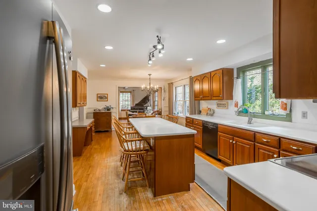 a bathroom with a sink a mirror and a toilet