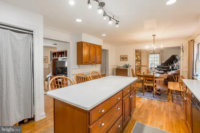 a view of a dining room with furniture and window