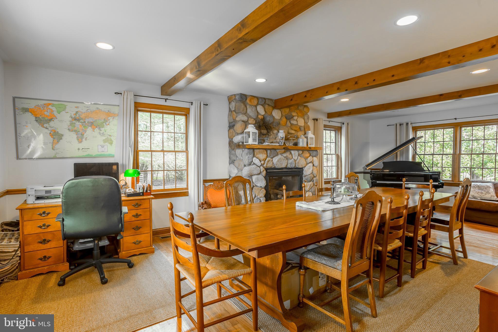 7904 Clark Road Denton, MD 21629 - Photo 26 of 71 a view of a dining room with furniture and a window