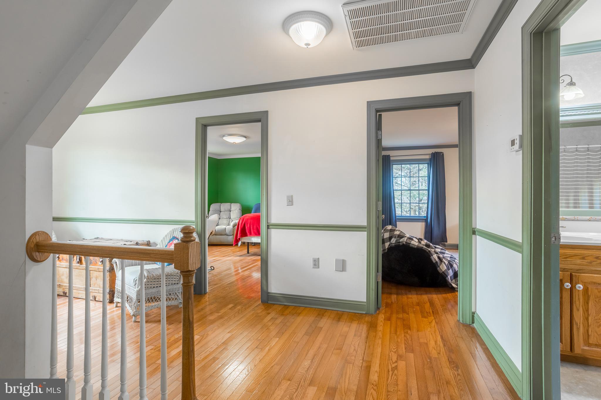 7904 Clark Road Denton, MD 21629 - Photo 28 of 71 a view of a livingroom with wooden floor and furniture