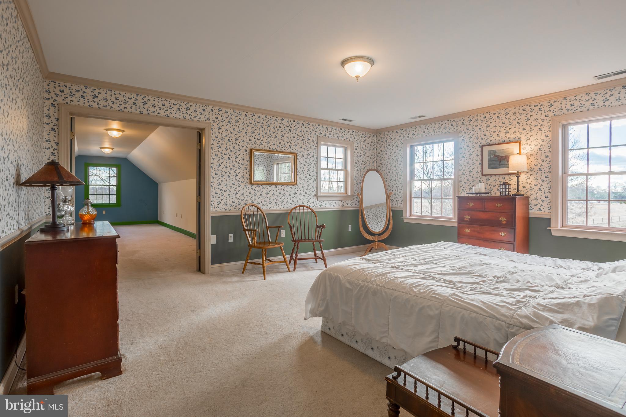 7904 Clark Road Denton, MD 21629 - Photo 35 of 71 a bed room with a bed and furniture