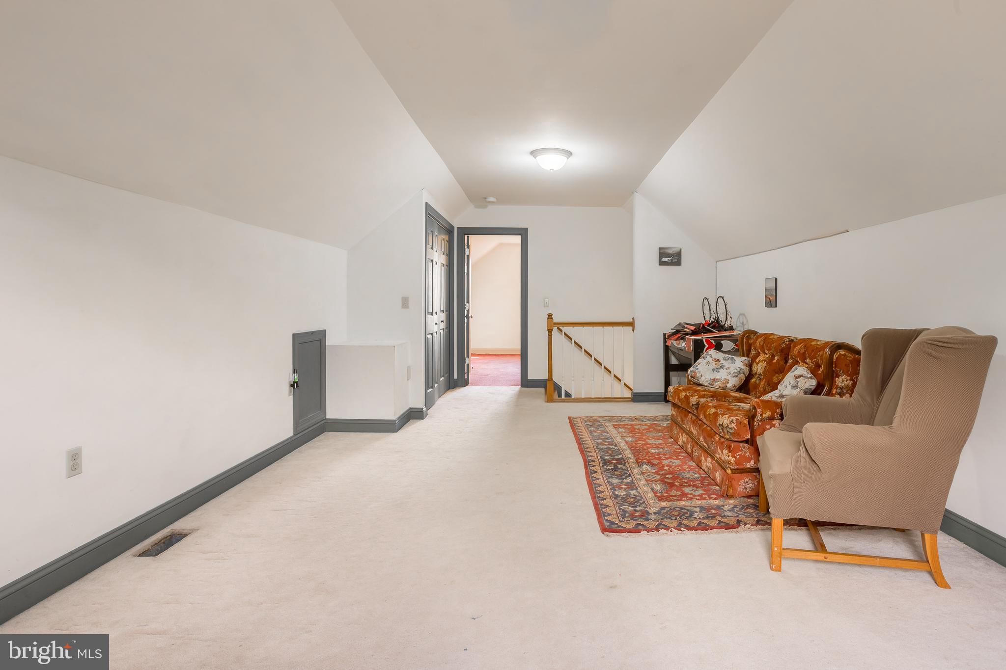 7904 Clark Road Denton, MD 21629 - Photo 46 of 71 a bed room with a bed and a chair