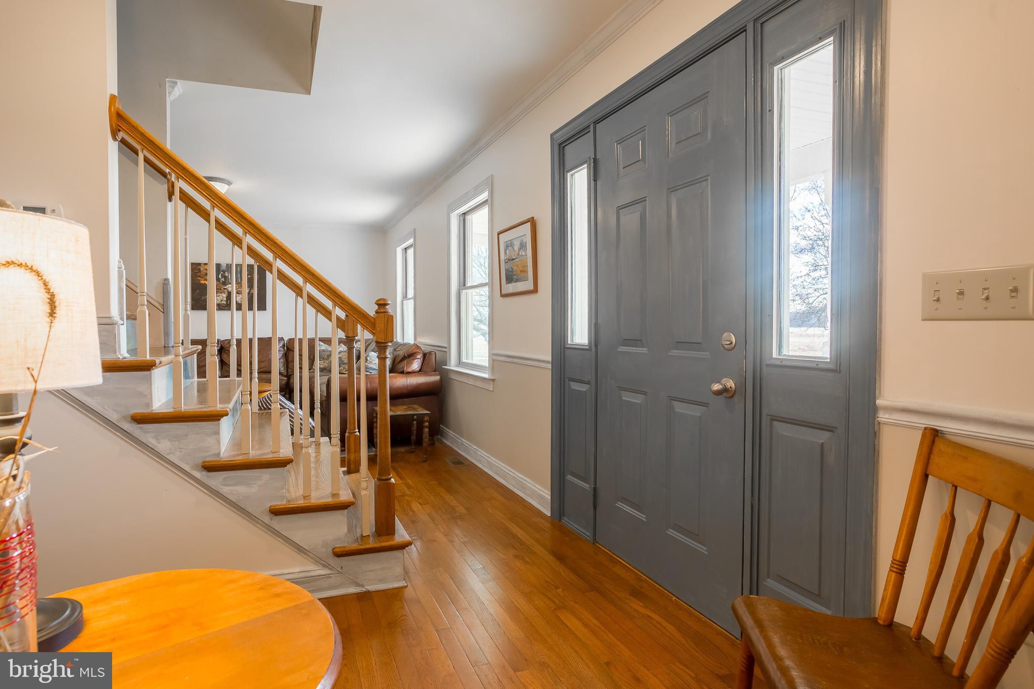 7904 Clark Road Denton, MD 21629 - Photo 9 of 71 a view of entryway and hall with wooden floor