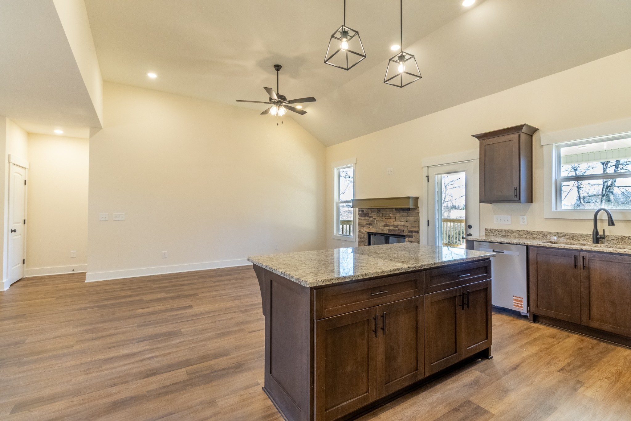 1203 Goose Drive Springfield, TN 37172 - Photo 7 of 29 a kitchen with kitchen island granite countertop a sink appliances and cabinets