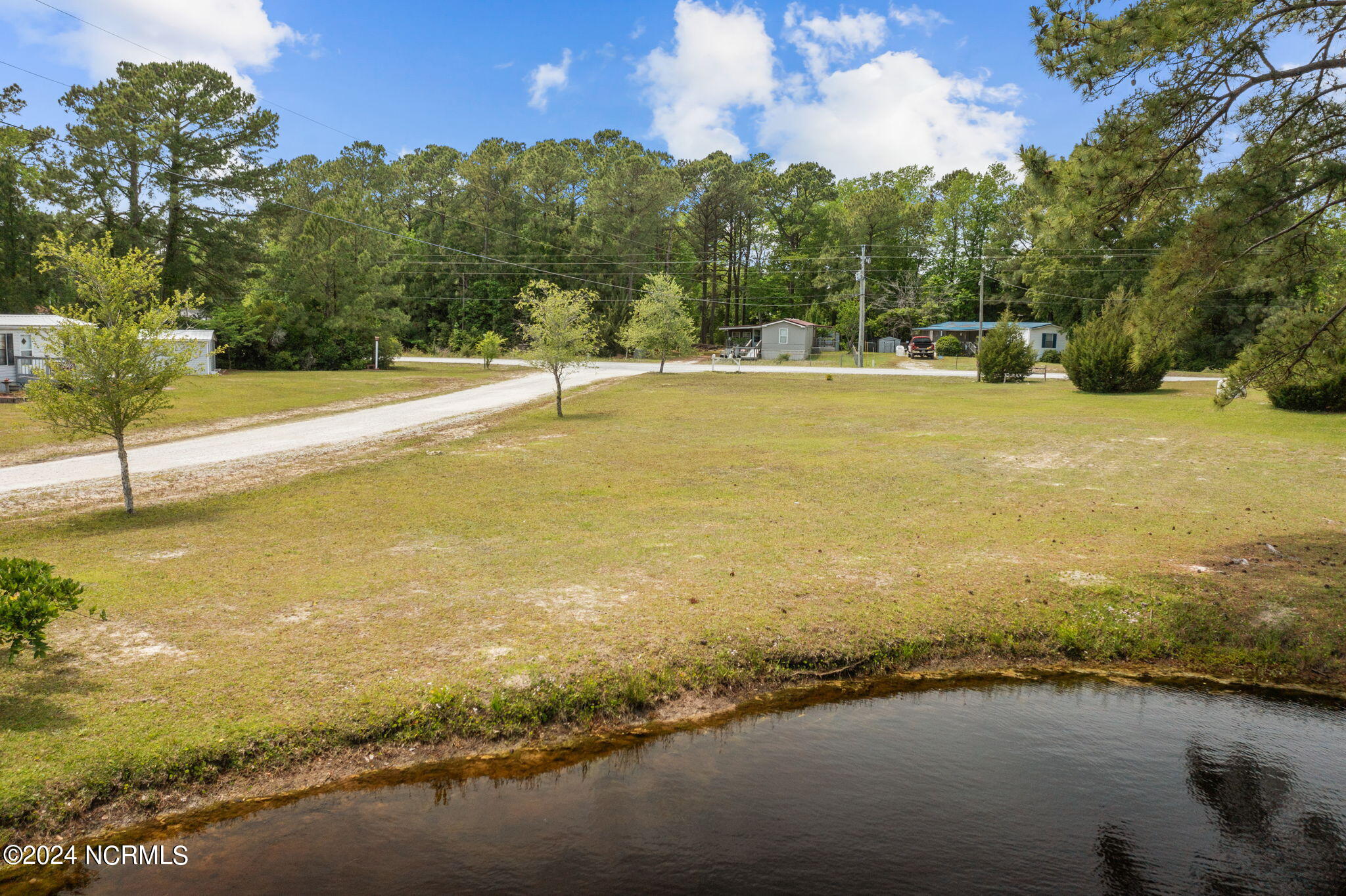20 R Shadow Ridge Road Hampstead, NC 28443 - Photo 3 of 14 22-web-or-mls-DJI_0461