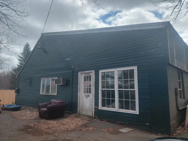 a front view of a house with a window