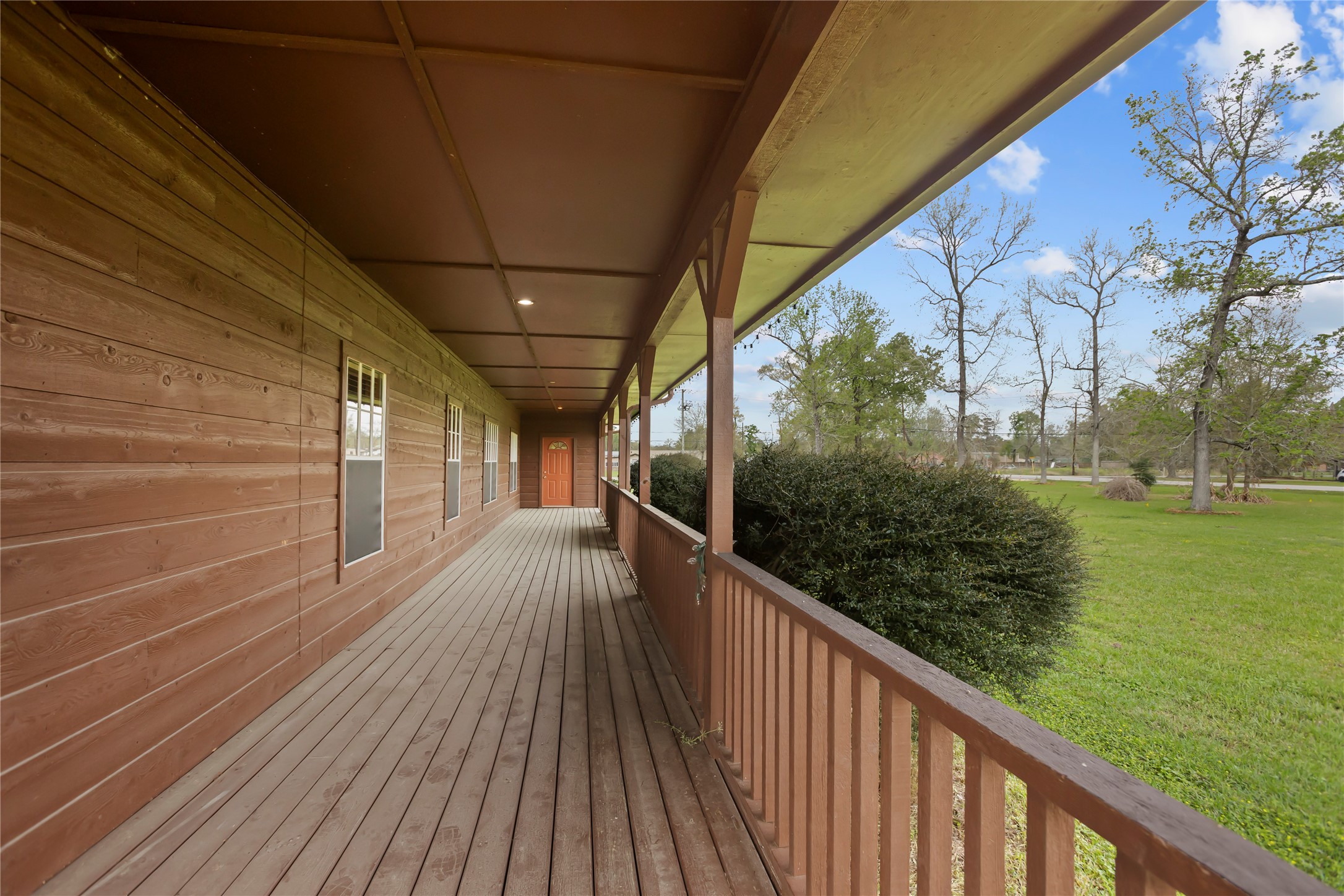 22916 East Martin Drive Porter, TX 77365 - Photo 3 of 43 a view of balcony with wooden floor