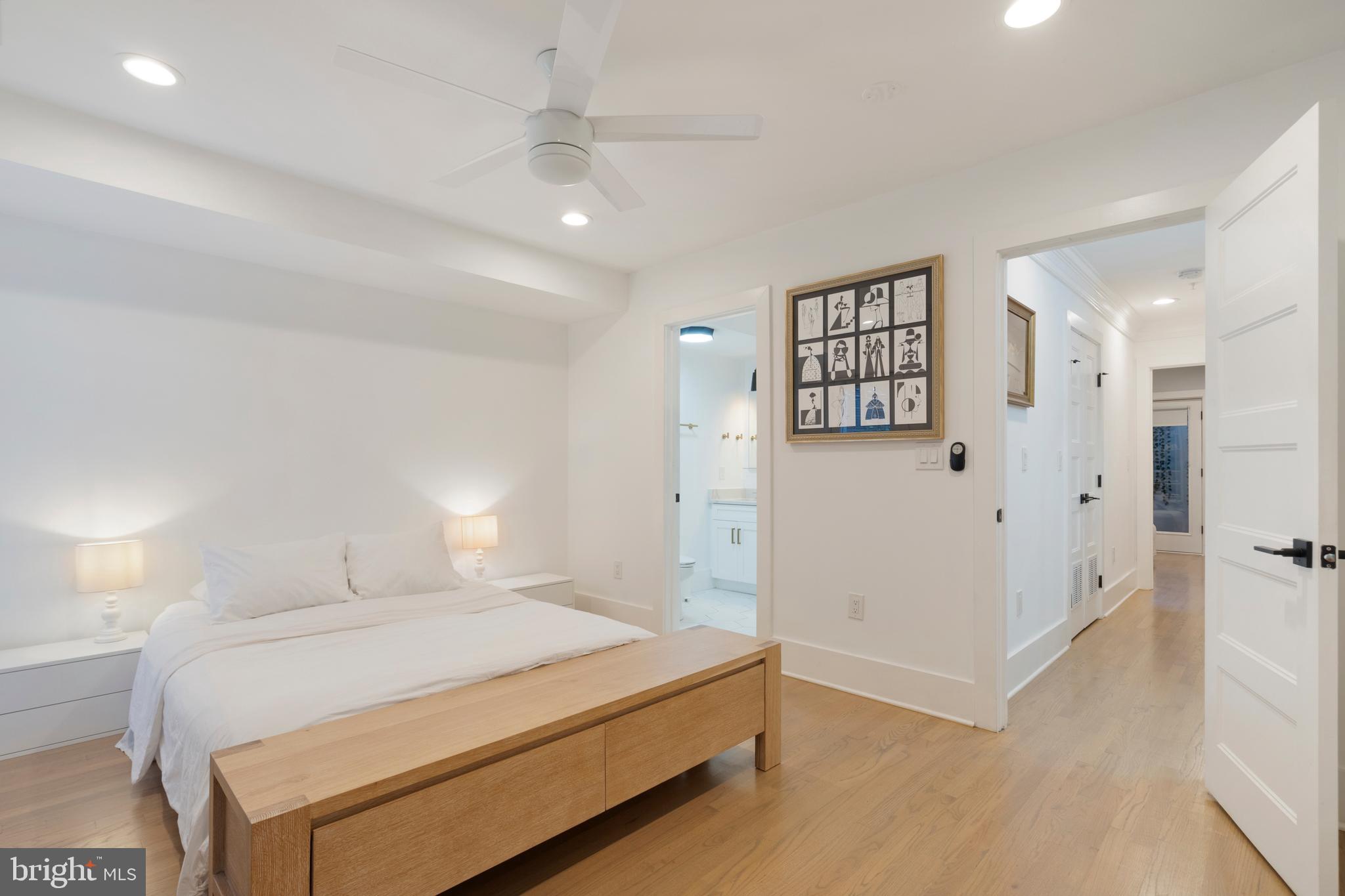 1427 West Virginia Avenue Northeast, Unit 1 Washington, DC 20002 - Photo 24 of 46 a spacious bedroom with a bed and a walk in closet