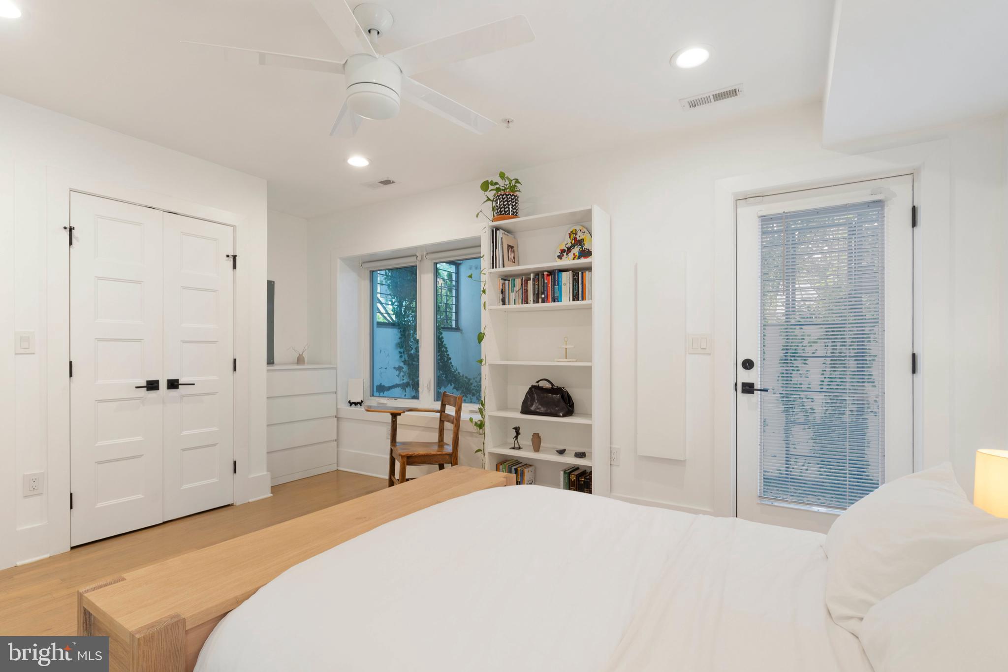 1427 West Virginia Avenue Northeast, Unit 1 Washington, DC 20002 - Photo 25 of 46 a spacious bedroom with a bed and a cabinets