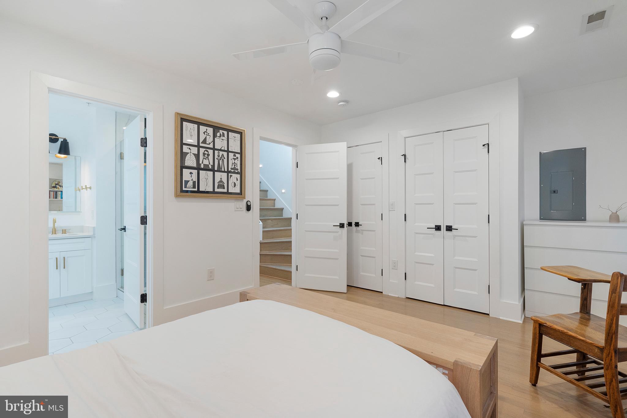 1427 West Virginia Avenue Northeast, Unit 1 Washington, DC 20002 - Photo 26 of 46 a bedroom with a bed and a view of bathroom