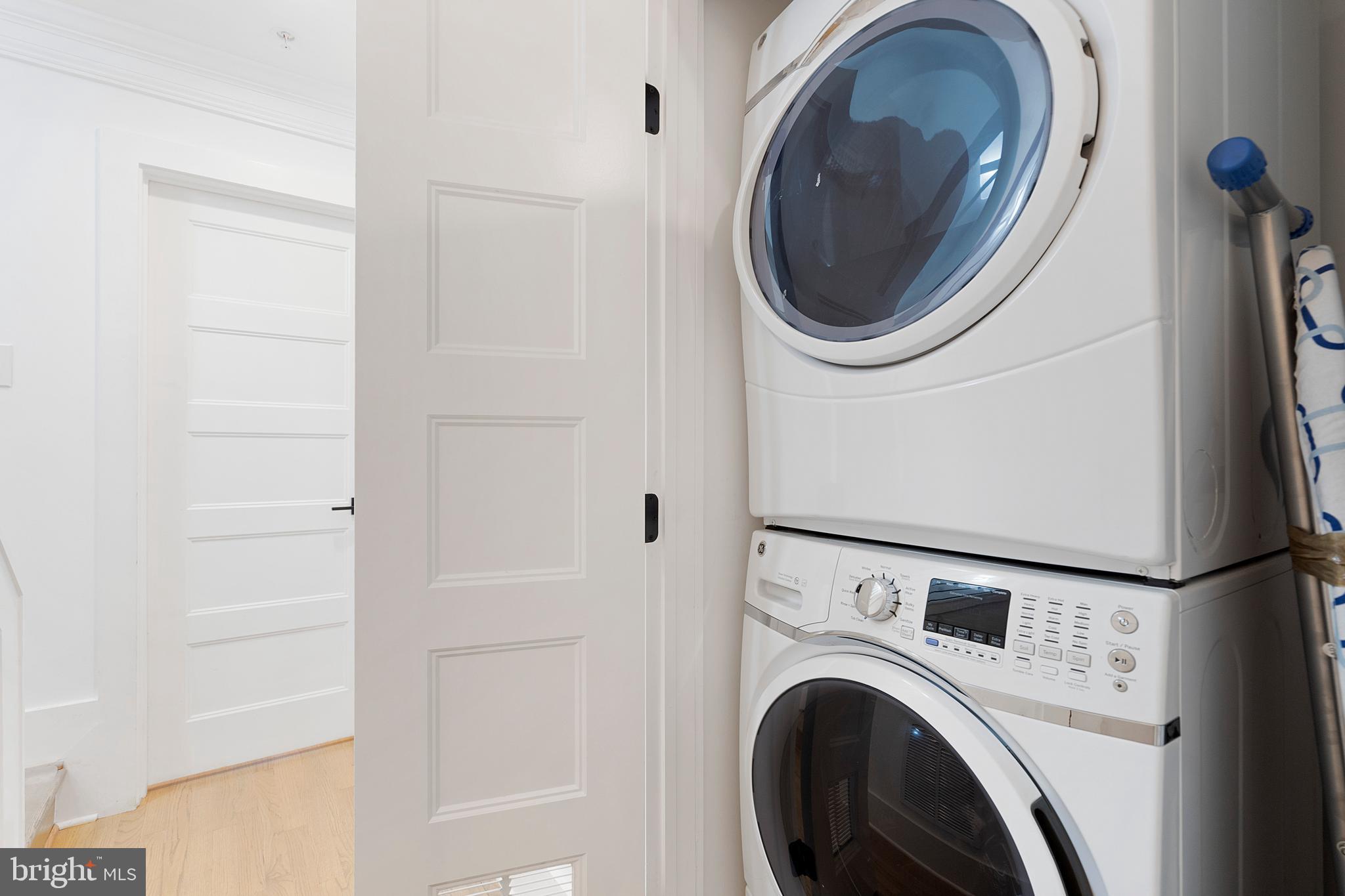 1427 West Virginia Avenue Northeast, Unit 1 Washington, DC 20002 - Photo 30 of 46 a utility room with dryer and washer