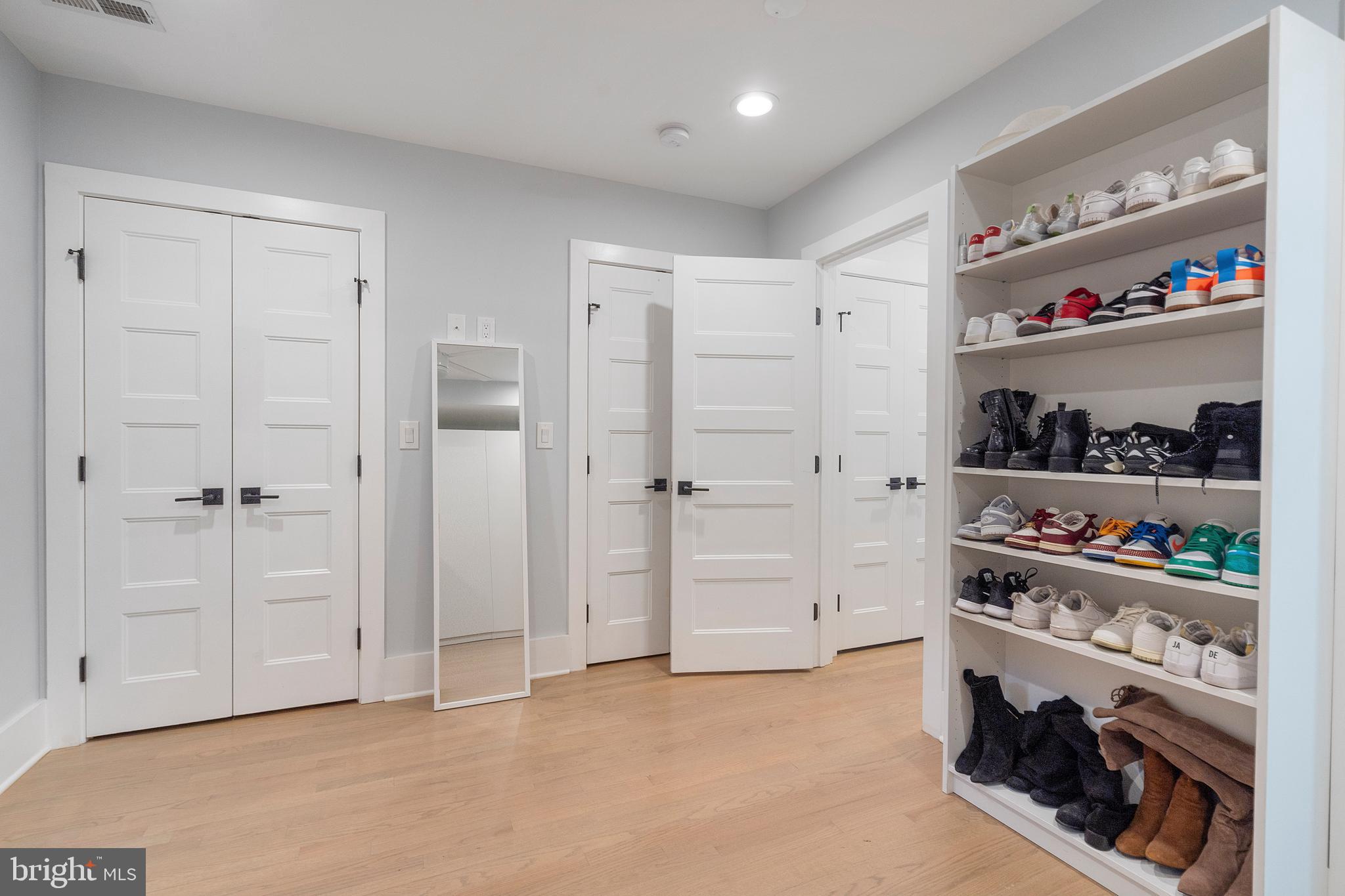 1427 West Virginia Avenue Northeast, Unit 1 Washington, DC 20002 - Photo 34 of 46 a room with white cabinets and window
