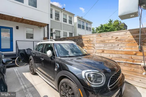a car parked in front of a building