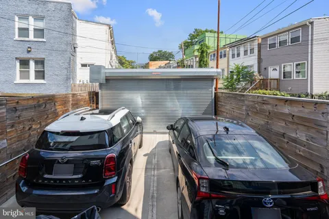 a kitchen with table and chairs