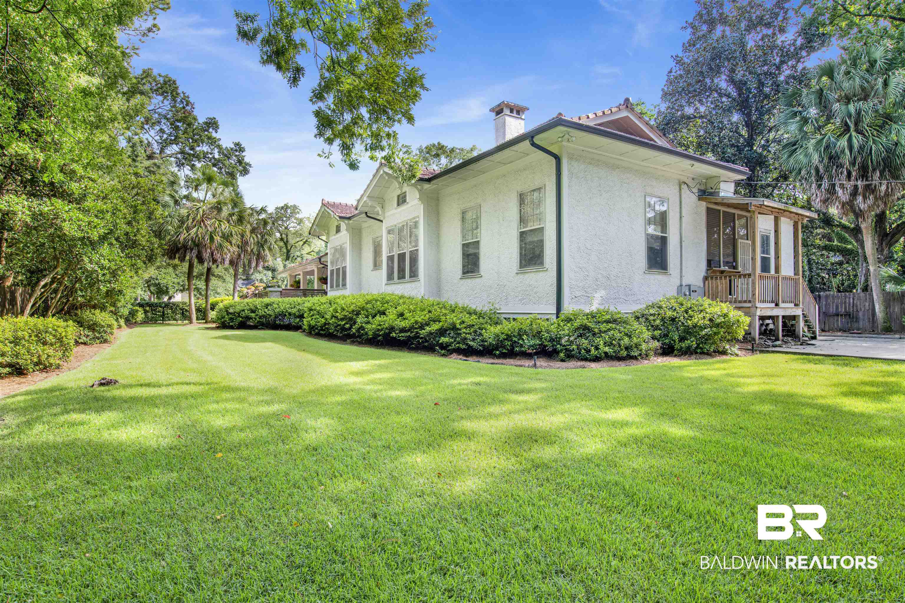 1654 Government Street Mobile, AL 36604 - Photo 41 of 45 View of property exterior with a lawn