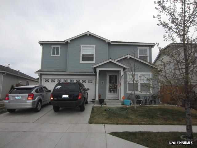 7784 Tulear Street Reno, NV 89506 - Photo 1 of 1 a view of a car parked in front of a house