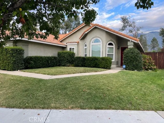 a house view with a garden space