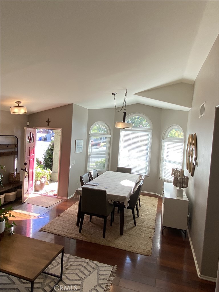 11682 Mt Baker Court Rancho Cucamonga, CA 91737 - Photo 2 of 5 a view of a dining room with furniture window and wooden floor