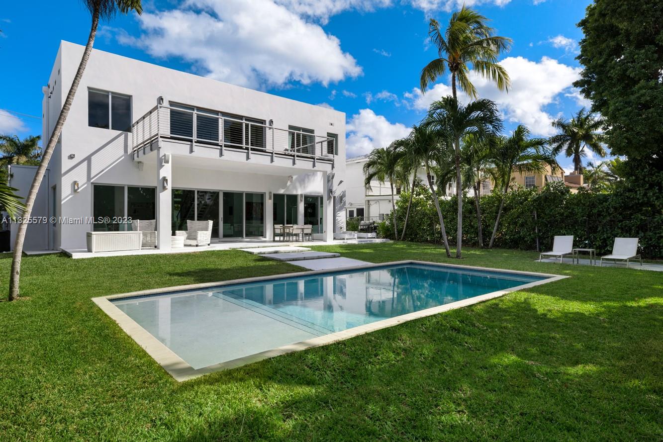 a view of a house with a swimming pool