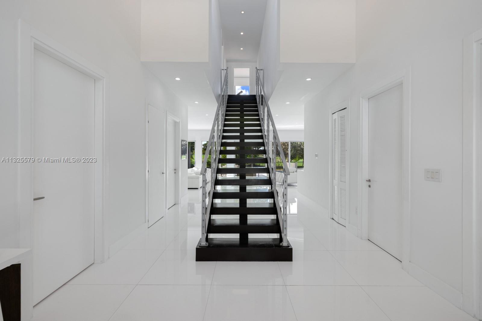 6050 La Gorce Drive Miami Beach, FL 33140 - Photo 14 of 31 a view of entryway with a front door
