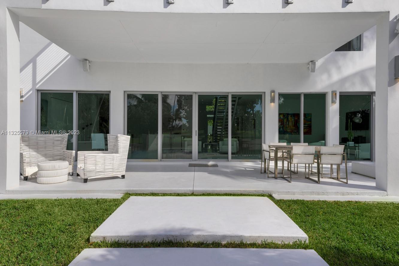 6050 La Gorce Drive Miami Beach, FL 33140 - Photo 27 of 31 a view of outdoor space yard and porch