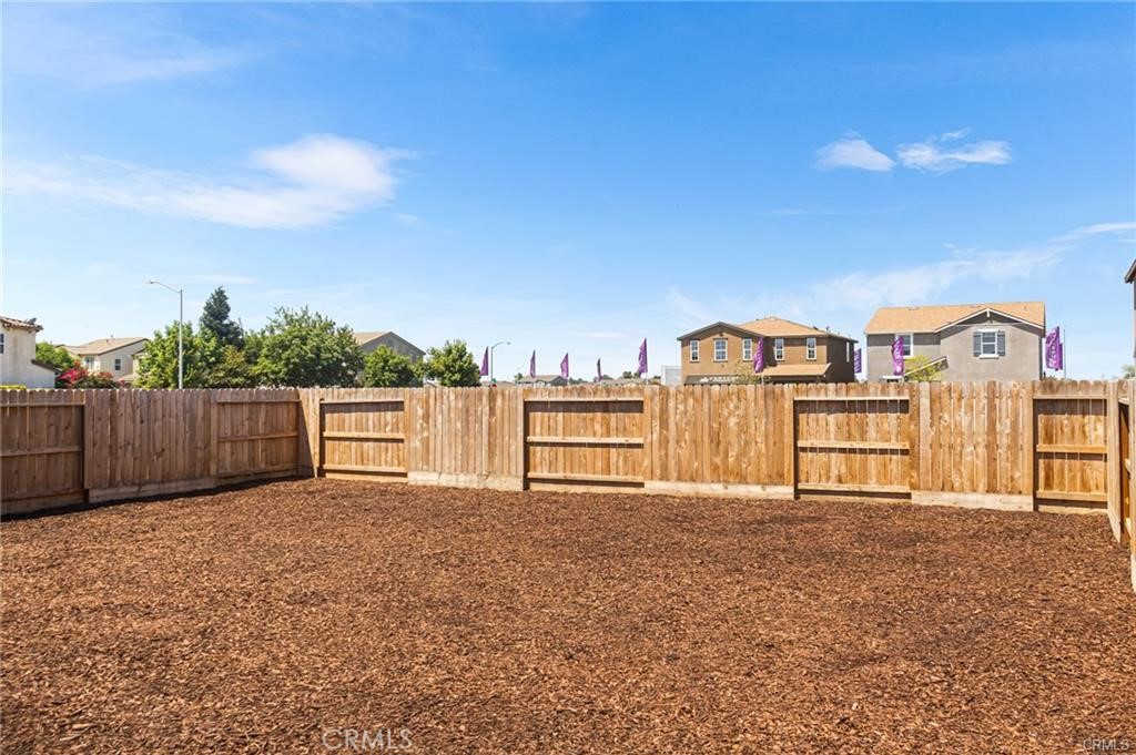 4119 Anise Court Merced, CA 95348 - Photo 14 of 17 a view of a house with a yard