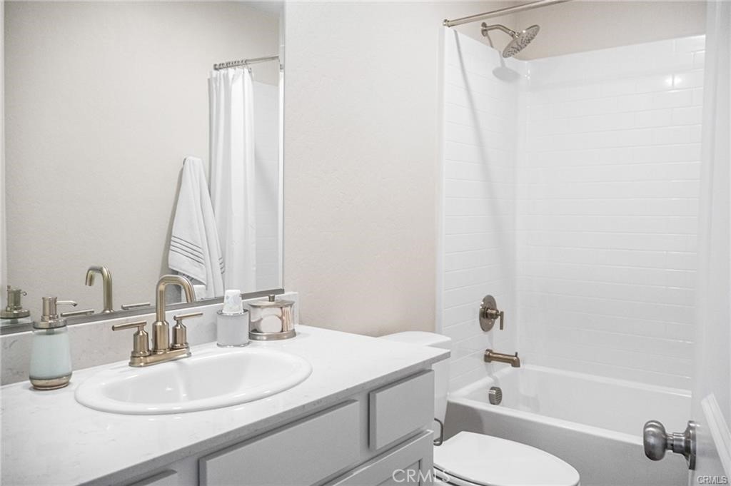 4119 Anise Court Merced, CA 95348 - Photo 7 of 17 a bathroom with a sink toilet and shower