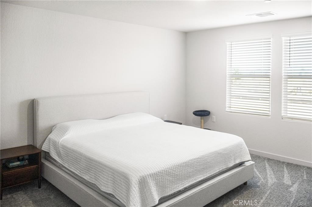 4119 Anise Court Merced, CA 95348 - Photo 9 of 17 a bedroom with a bed and a window