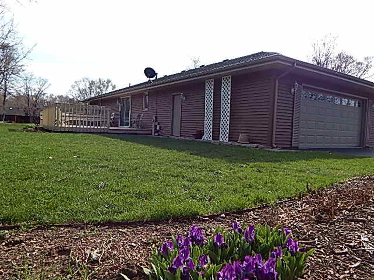 9925 Bitterroot Road Roscoe, IL 61073 - Photo 21 of 25 a view of a back yard of the house