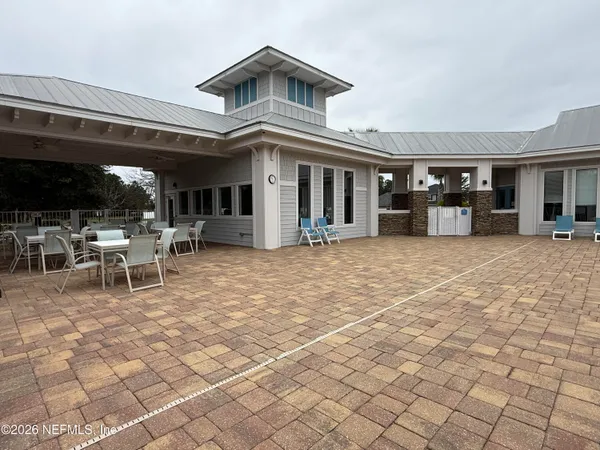 a view of a building with chairs