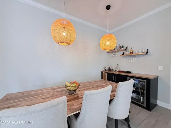 a room with a table and chairs