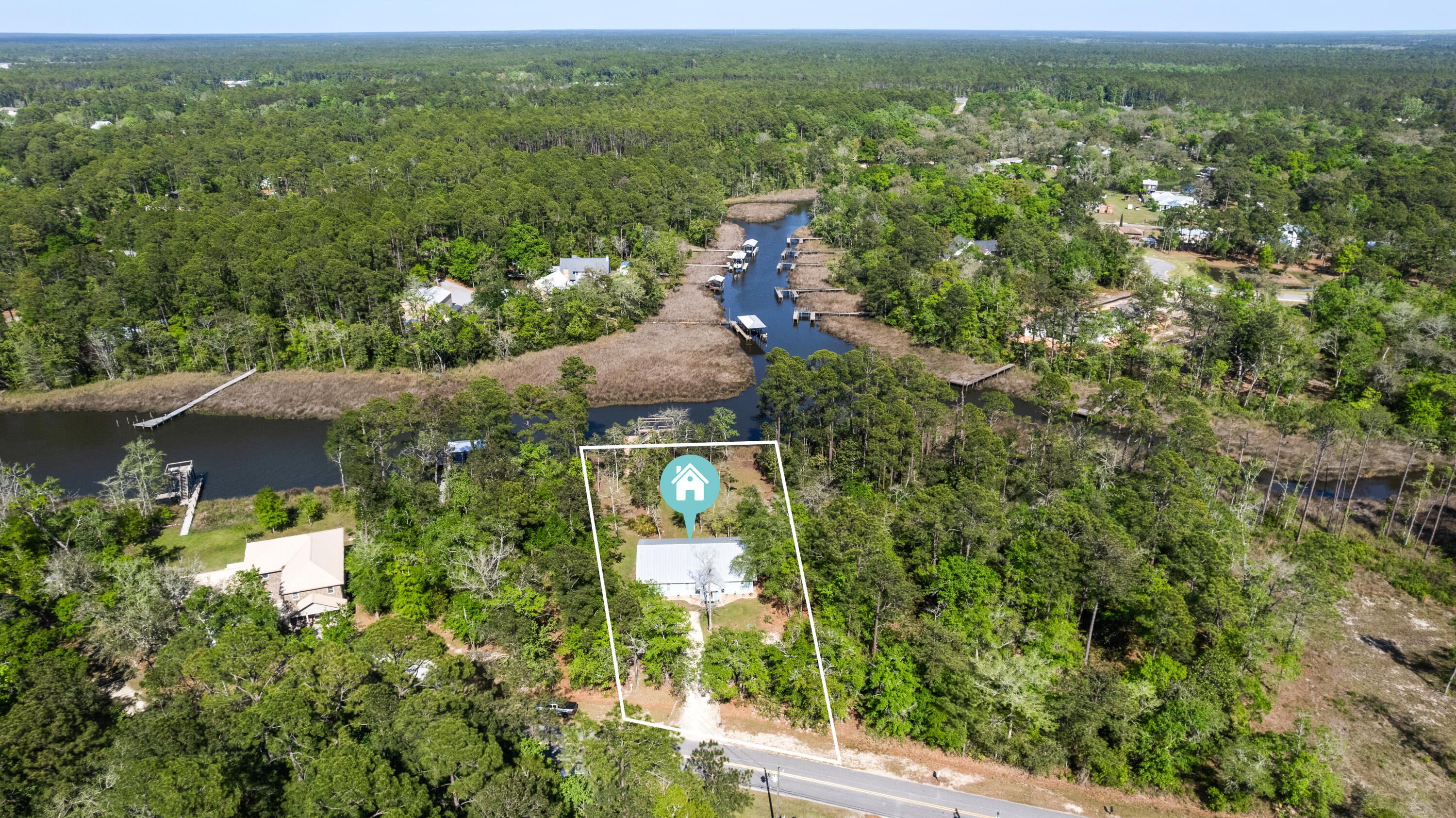 528 Bay Grove Road Freeport, FL 32439 - Photo 66 of 68 an aerial view of a house with yard