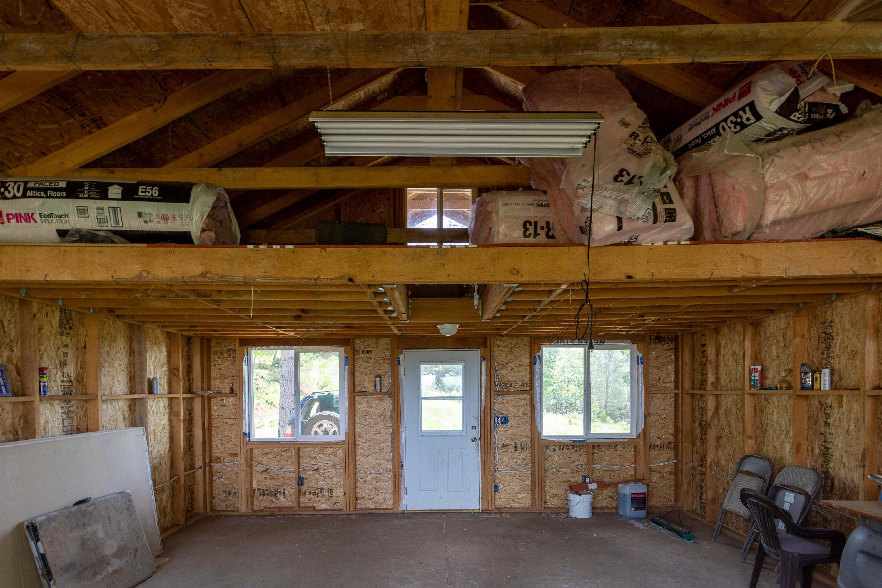 320 Acres Melton Road Bella Vista, CA 96008 - Photo 4 of 19 a view of a room with large windows