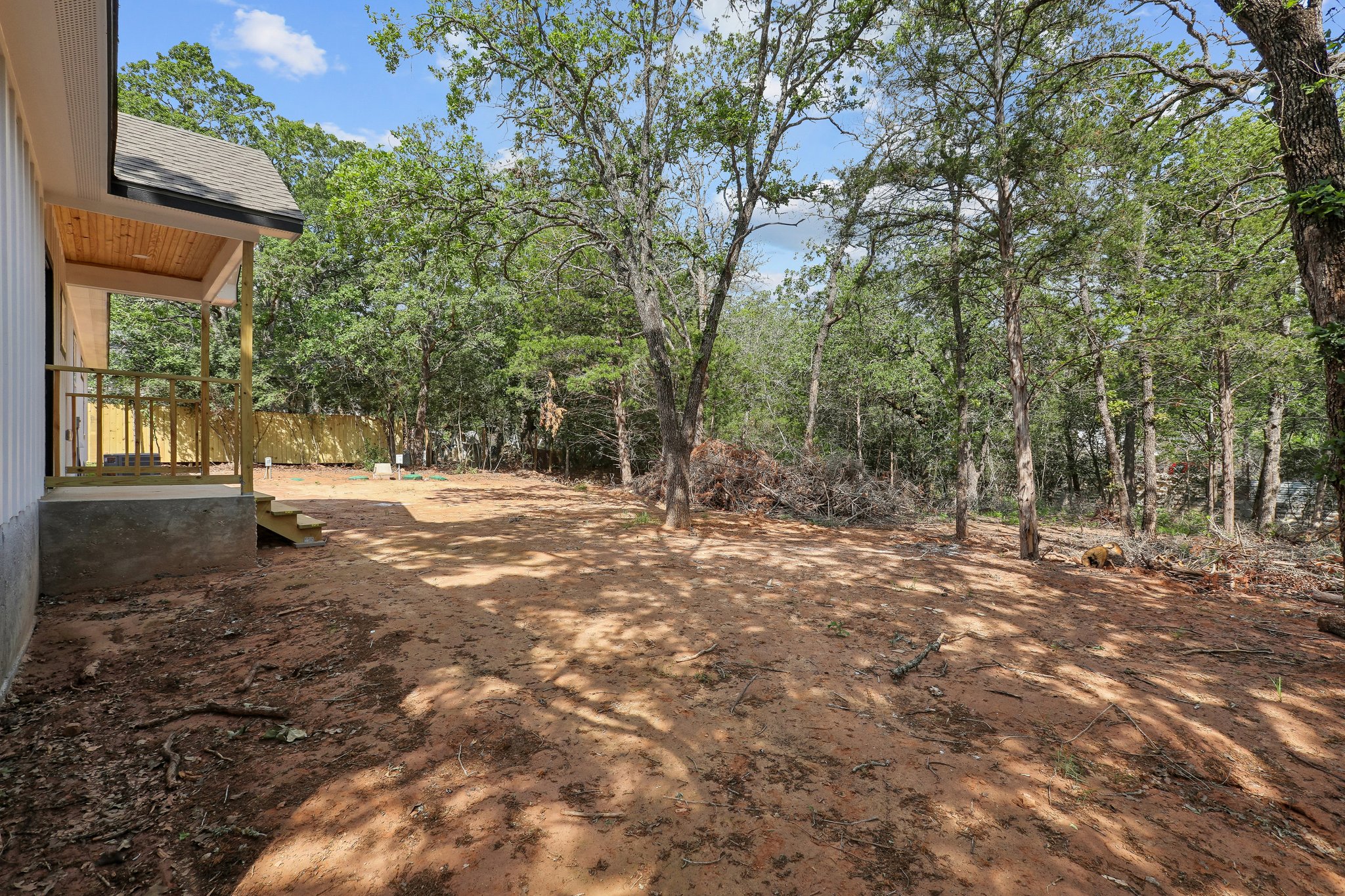 210 Flint Ridge Street Bastrop, TX 78602 - Photo 35 of 40 a view of outdoor space with trees
