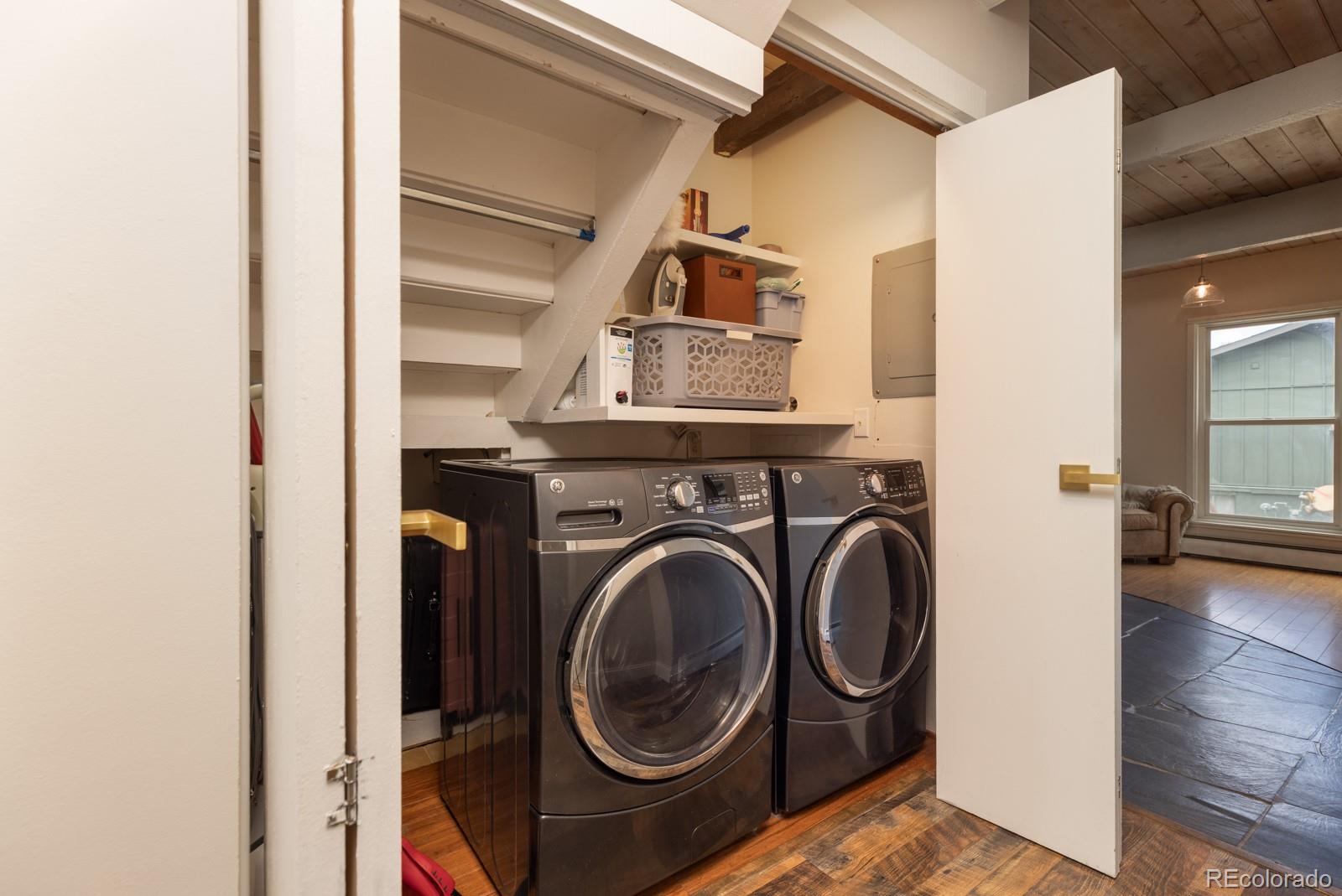 213 Big Elk Road Dillon, CO 80435 - Photo 25 of 50 a utility room with dryer and washer