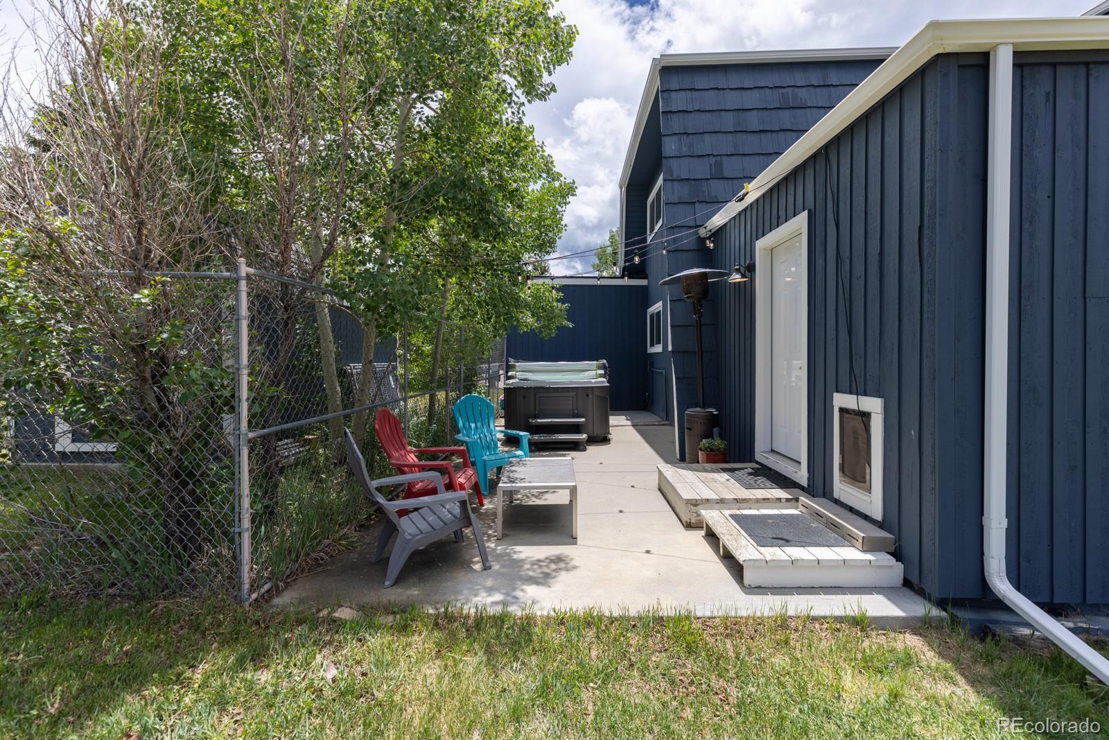 213 Big Elk Road Dillon, CO 80435 - Photo 46 of 50 a view of house with backyard and outdoor seating