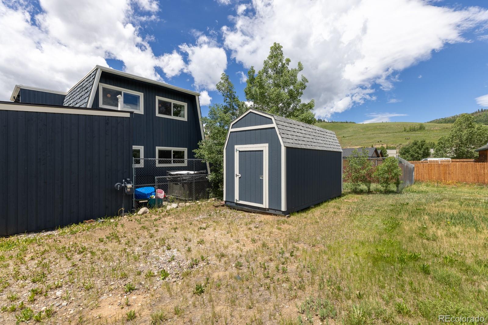 213 Big Elk Road Dillon, CO 80435 - Photo 49 of 50 a view of a house with a patio